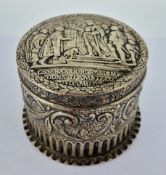 A Victorian silver foliate embossed box, with medieval scene to the lid 'CRS.MAX.CORONAMIMP.
