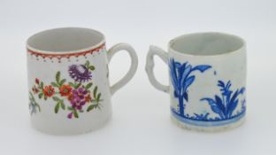 Two Bow cans, to include one of polychrome floral decoration, the other of monochrome blue painted