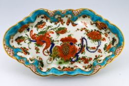 A shallow Worcester dish in Jabberwocky pattern, length 15.5cm.