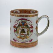 A Chinese Armorial Tankard, Kangxi (1662-1722), of cylindrical form applied with a double strap