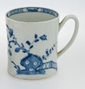 An early Worcester can, blue floral decoration.