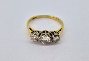 A diamond three stone set ring, set in 18ct yellow gold, size J, approx 2.2g.