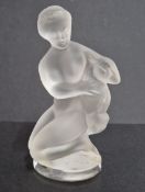 A Lalique crystal figure 'Diane' depicting a kneeling Diana the Huntress with fawn, frosted