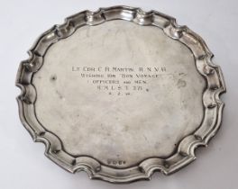 A silver salver, hallmarked Birmingham 1932, inscribed 'Lt. Cdr. C.R.Martin. R.N.V.R, Wishing Him "