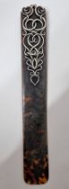 An Art Nouveau silver and tortoise shell page marker, swirling silver decoration hallmarked London