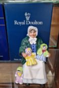 A Royal Doulton figurine ‘The Rag Doll Seller’ HN2944.