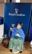 A Royal Doulton figurine ‘Tuppence a Bag’ HN2320.
