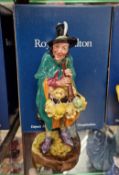 A Royal Doulton figurine ‘The Mask Seller’ HN2103.