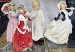 Four Royal Doulton figurines, to include ‘Christmas Morn’ HN1946, ‘Autumn Breezes’ HN8147, ‘Miss