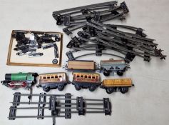 Hornby, an O gauge locomotive engine, together with wagons, carriages and track.