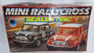 Scalextric Mini Rallycross, in original box, with Lapcounter C277, Red and black Mini racers,