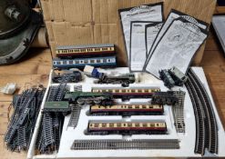 Mainline, three locomotives, with another, with a fitted collection of track and spare track,