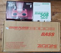 A Zoom 508 DELAY pedal, ac-dc converter missing, S/N 0205022, together with a Zoom B1 Bass Effects