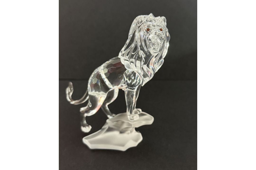 Swarovski Crystal Glass, 'Lion Standing on Rock', boxed.