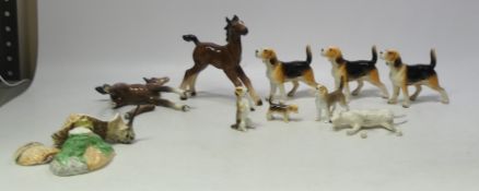 A Collection of Beswick and unmarked Animal Figures including Dogs, Horses and Woodcock. Some broken