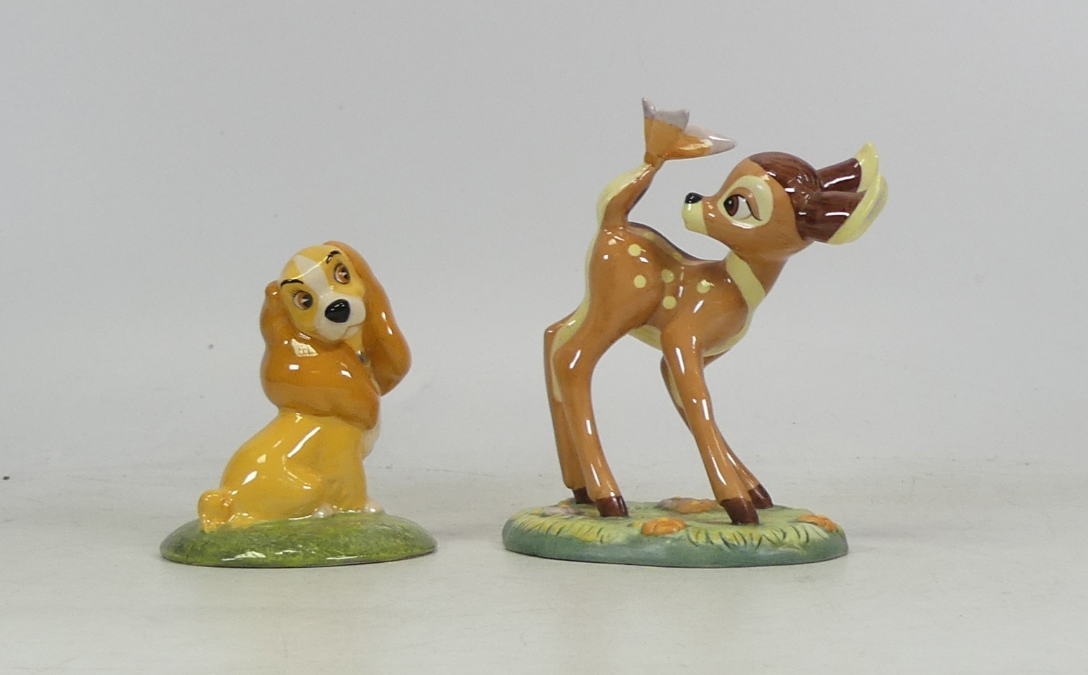 Two Royal Doulton Disney Showcase figures Lady PC7 and Bambi DM26 (2)