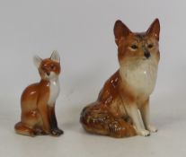 A Coopercraft Model of a Seated Fox together with Russian smaller example (2)