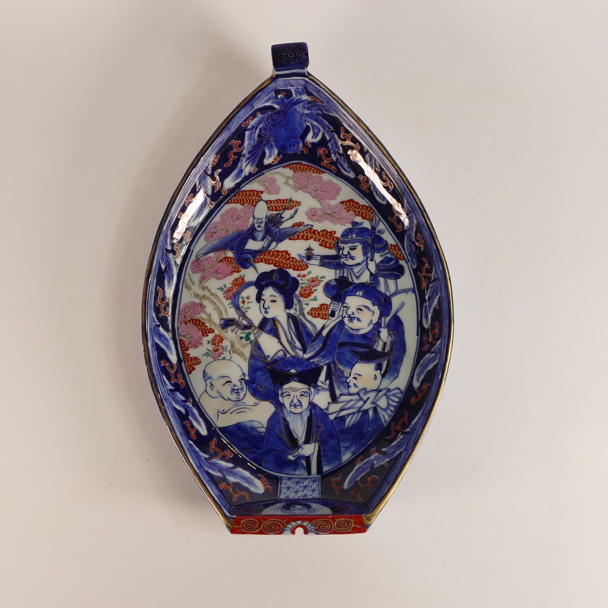 Japanese Imari large shallow bowl of ship form. Signed in red to base. Length: 34cm