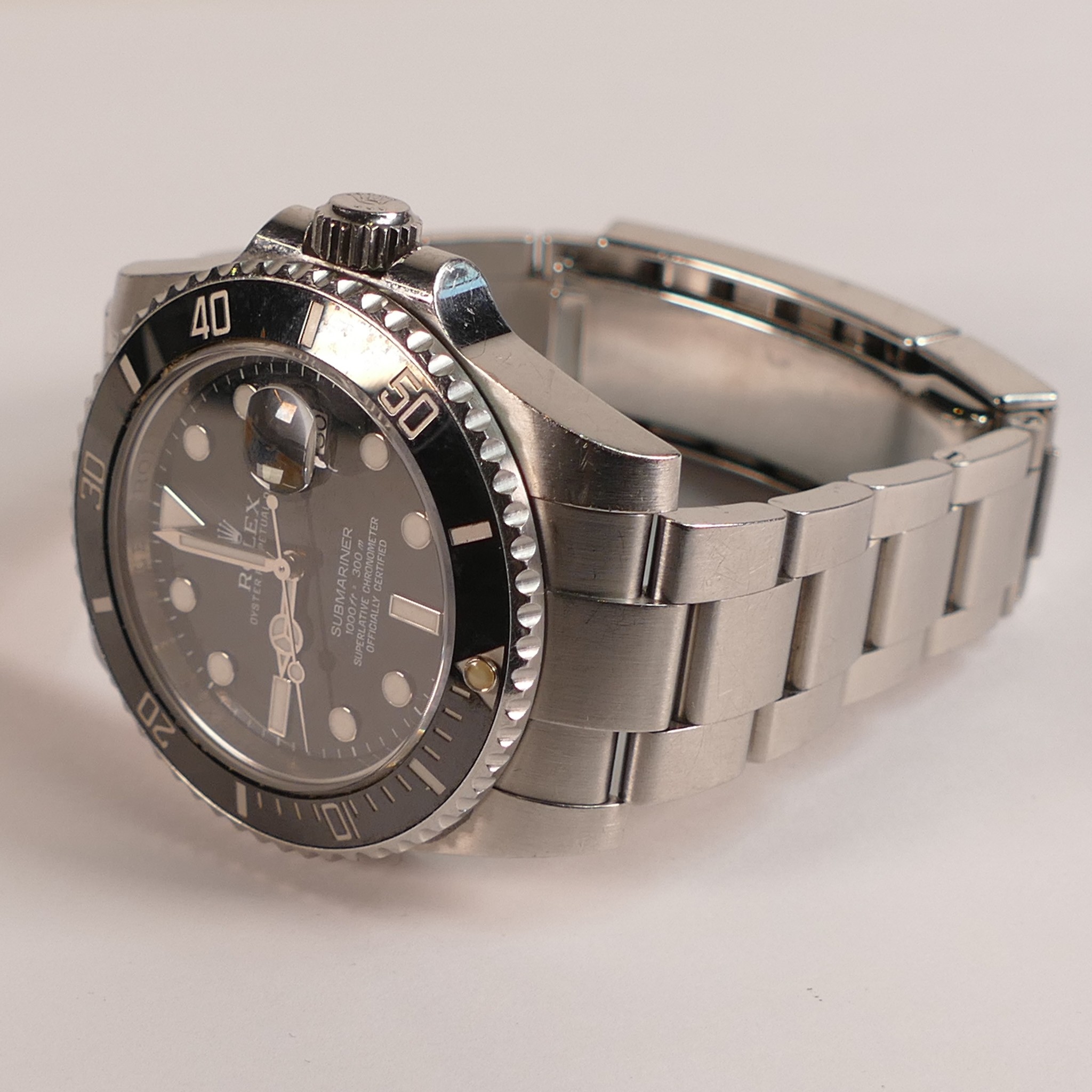 ROLEX Oyster Perpetual date SUBMARINER gents stainless steel wristwatch, winds, ticks, sets &