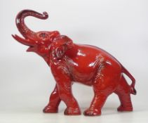 20th Century Model of an Elephant in Salute. In a Red Flambe Type Colourway. Height: 35cm