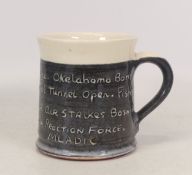 Isabella Pope, Studio Pottery Mug with inscribed political events from 1995. Pope was a Master