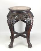 Late 19th Century Chinese Marble Top Table. Carved foliate apron and legs on claw feet. Height: