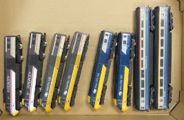 Collection of Hornby OO gauge InterCity 125 in various liveries and includes two carriages. (1