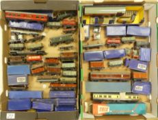 Collection of Hornby Dublo OO gauge carriages and freight wagons, parcel vans and tankers amongst