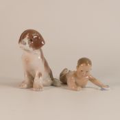 Royal Copenhagen porcelain models - one of a seated puppy, model 739 and one model of a crawling