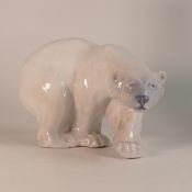 Royal Copenhagen, large model of a polar bear, model 1137, H. 17cm x L. 27cm.