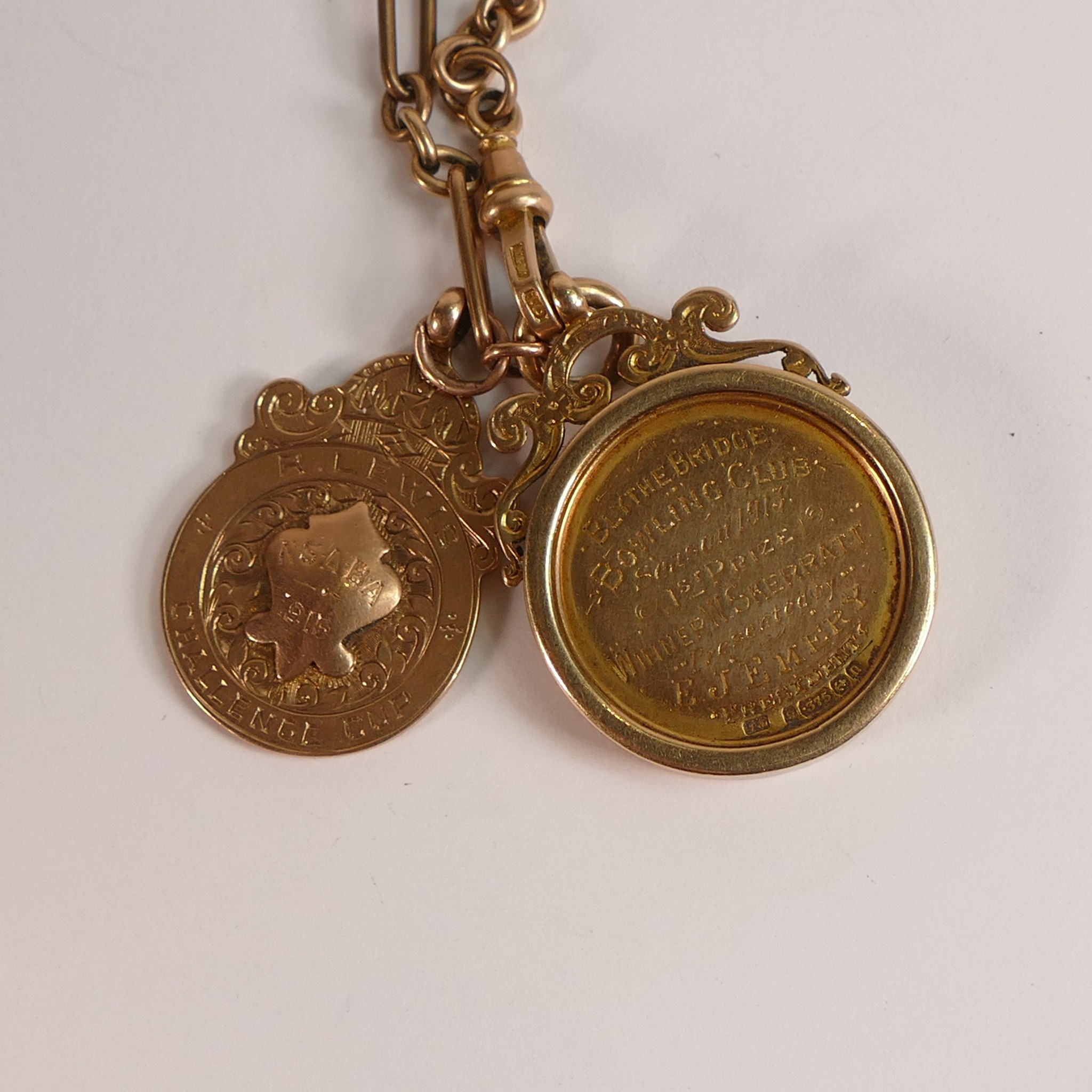 9ct Gold watch chain & 2 x hallmarked gold fobs. Chain tested as 9ct, and dog clip marked 10c. - Image 3 of 3