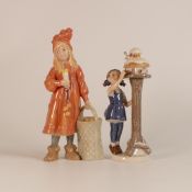 Royal Copenhagen porcelain models - girl with apples and another model of girl feeding birds,