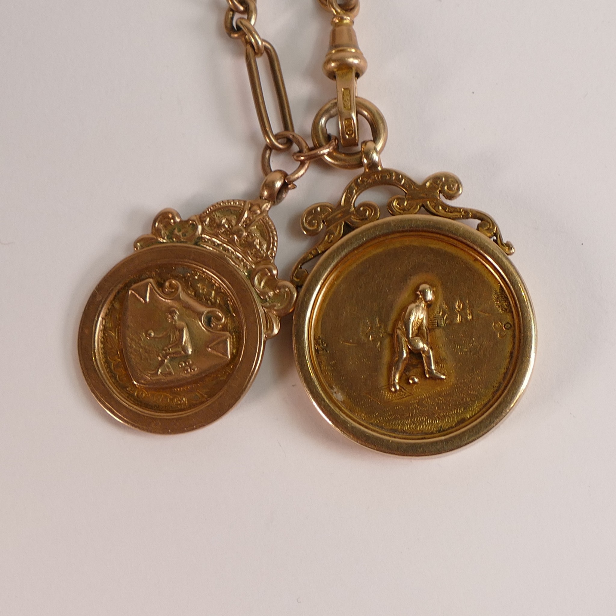 9ct Gold watch chain & 2 x hallmarked gold fobs. Chain tested as 9ct, and dog clip marked 10c. - Image 2 of 3