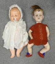 Two Armand Marseille Bisque head dolls with jointed bodies working sleeping eyes , one baby