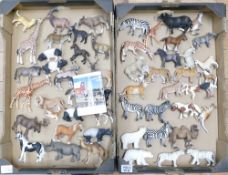 A large collection of Schleich animals figures to include giraffes, pigs, horses, moose, panda,