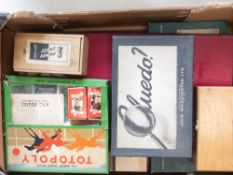 A collection of boxed board games to include Totopoly horse racing game, Cluedo, Scrabble and