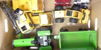 Collection of vintage Tonka toys tractor and trailer, mobile crane, earth mover and dumper truck.