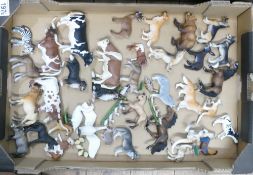 A large collection of Schleich animal figures to include Kangaroo, horses, dogs, cows, swans, pigs