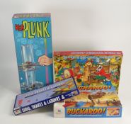 A collection of board games to include Buckaroo, Ker Plunk, 70 piece wooden jigsaw, Ludo and