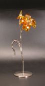 Swarovski Crystal Paradise flower collection, amber coloured daffodil 'Dillia Topaz' 22cm tall,