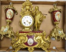 Overpainted three piece clock garniture, height of tallest piece 42cm (3).