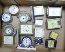 A collection of clocks to include desk clocks, novelty oversize pocket watches, Wedgwood small