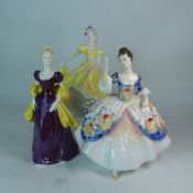Three Royal Doulton lady figures to include Loretta HN2337, Christine HN2792 and Ninette HN2379. (H: