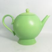 Nick Munro Art Deco style teapot in matt green glaze, height 20cm.