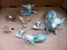 A collection of SZeiler studio animals to include various size cow's and deer's. (1 Tray)