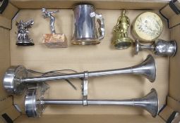 Mixed metal ware to include a pair of chrome air horns, brass blacksmith figure, Art Deco style