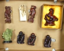 Collection of Oriental red resin figures and a Jadeite Buddha (1 tray).