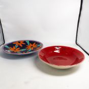 Poole Studio Pottery charger designed and decorated by Nicky Massarella with stylised flowers in