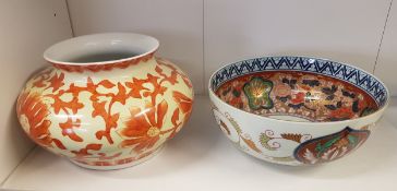 A Chinese squat vase decorated with flowers together with a Japanese fruit bowl decorated in the