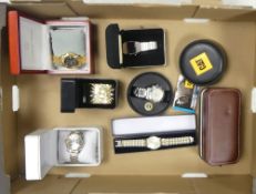 A collection of quartz watches including a boxed gents Caterpillar example, a Rotary gents watch and